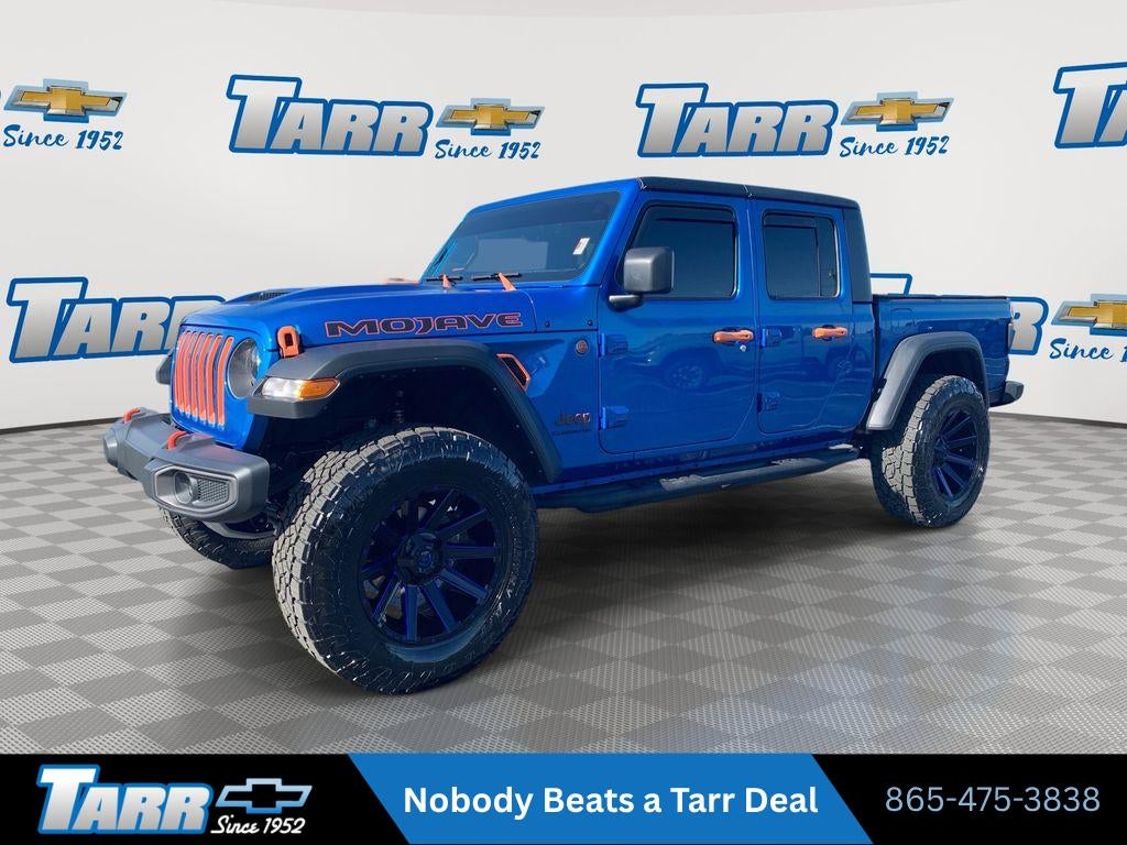 2022 Jeep Gladiator Mojave in Hydro Blue Pear — front three-quarter view