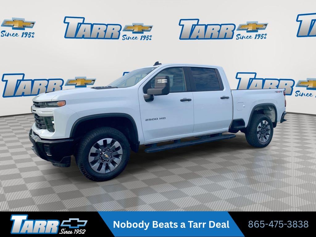 2024 Chevrolet Silverado 2500 HD Custom in Summit White — front three-quarter view