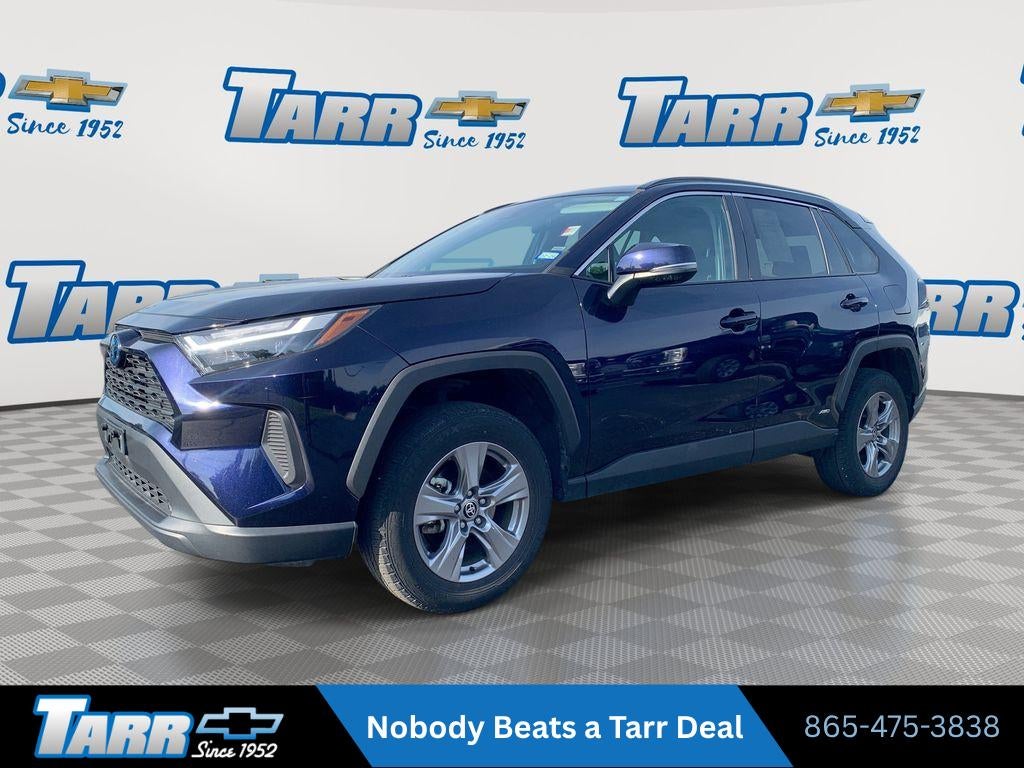 2024 Toyota RAV4 Hybrid XLE in Blue — front three-quarter view
