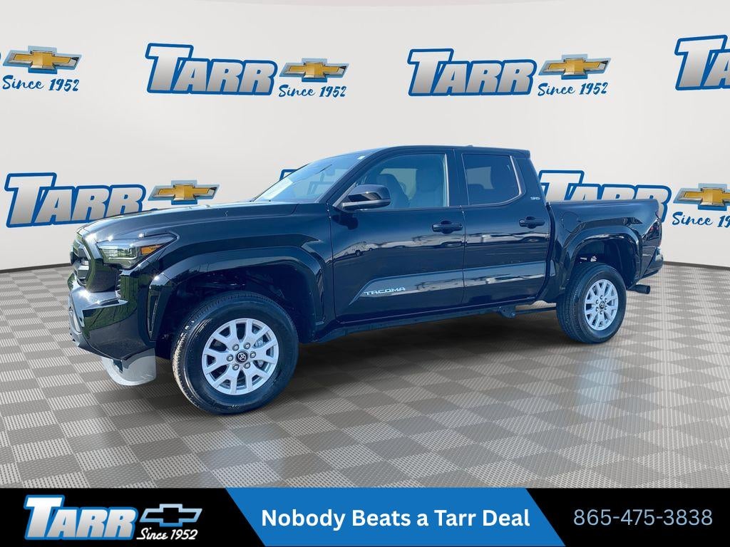 2025 Toyota Tacoma 4WD SR in Black — front three-quarter view