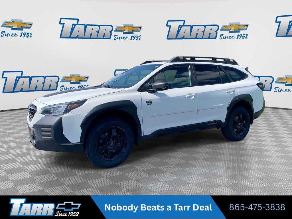 2022 Subaru Outback Wilderness in Crystal White P — front three-quarter view