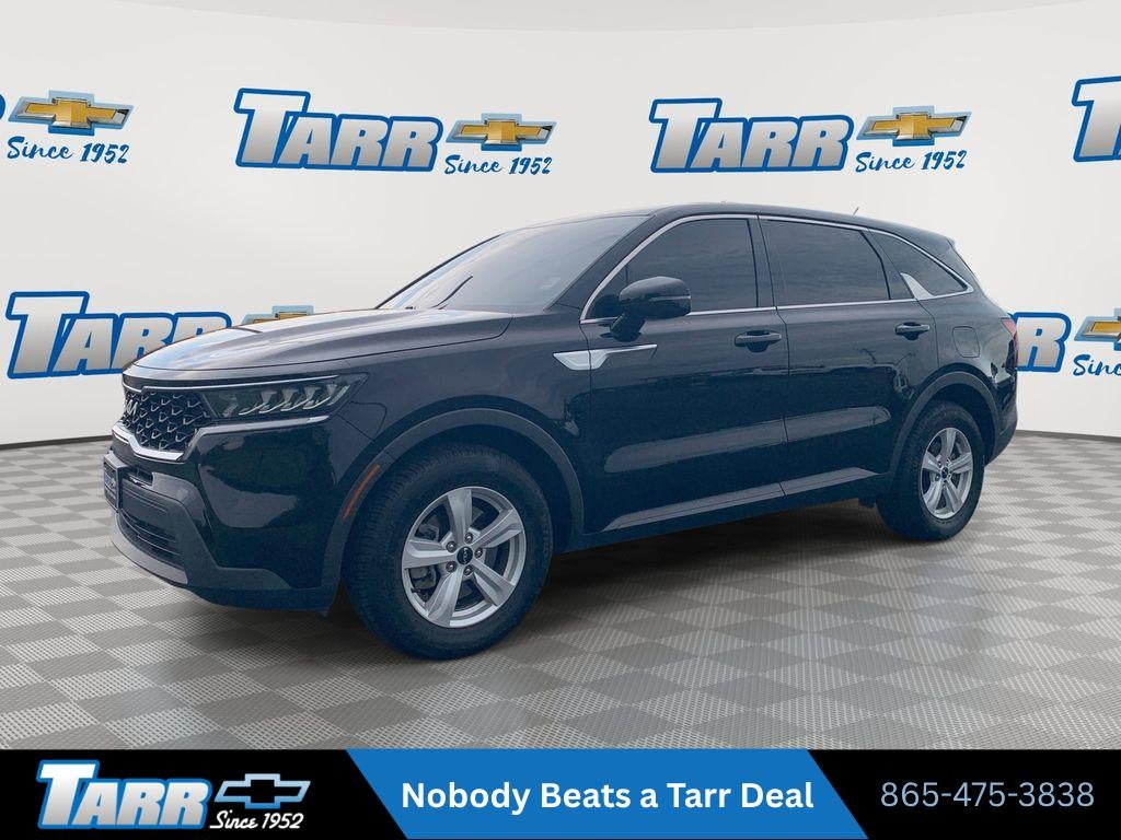 2023 Kia Sorento LX in Ebony Black — front three-quarter view